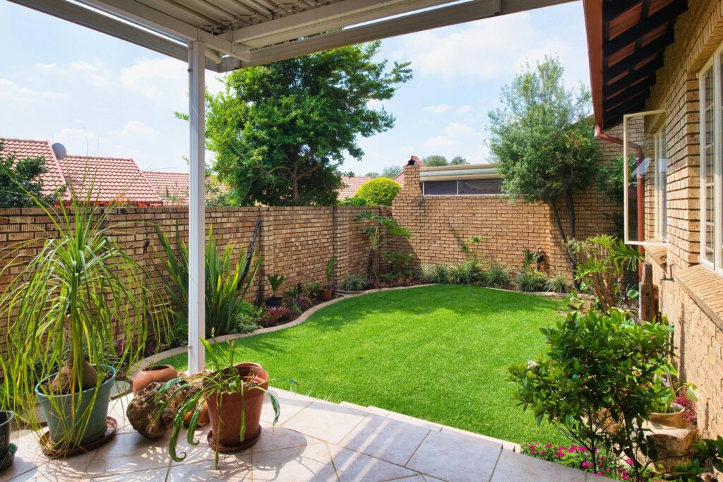 Backyard garden of a single-family home showing direct connection to the earth’s energy in Feng Shui.
