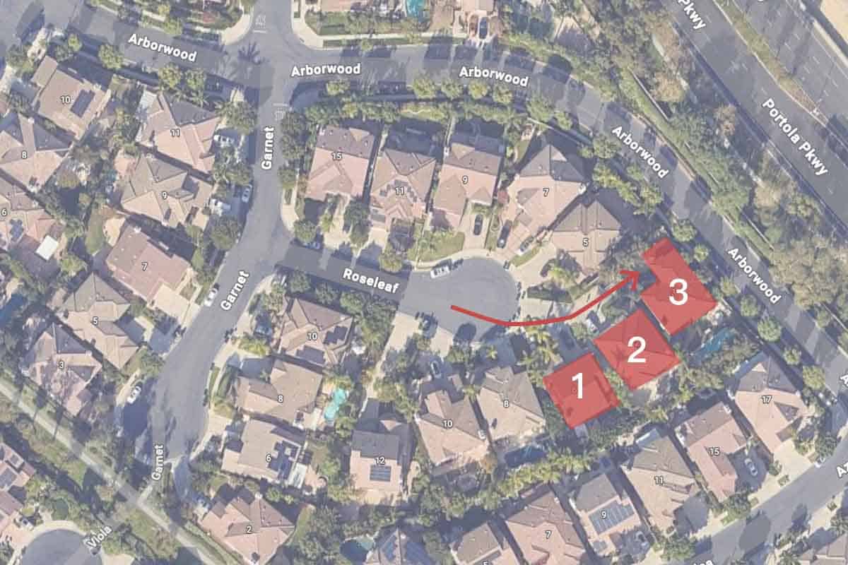 Aerial view of a cul-de-sac showing overlapping driveway access and homes located deep within the layout.
